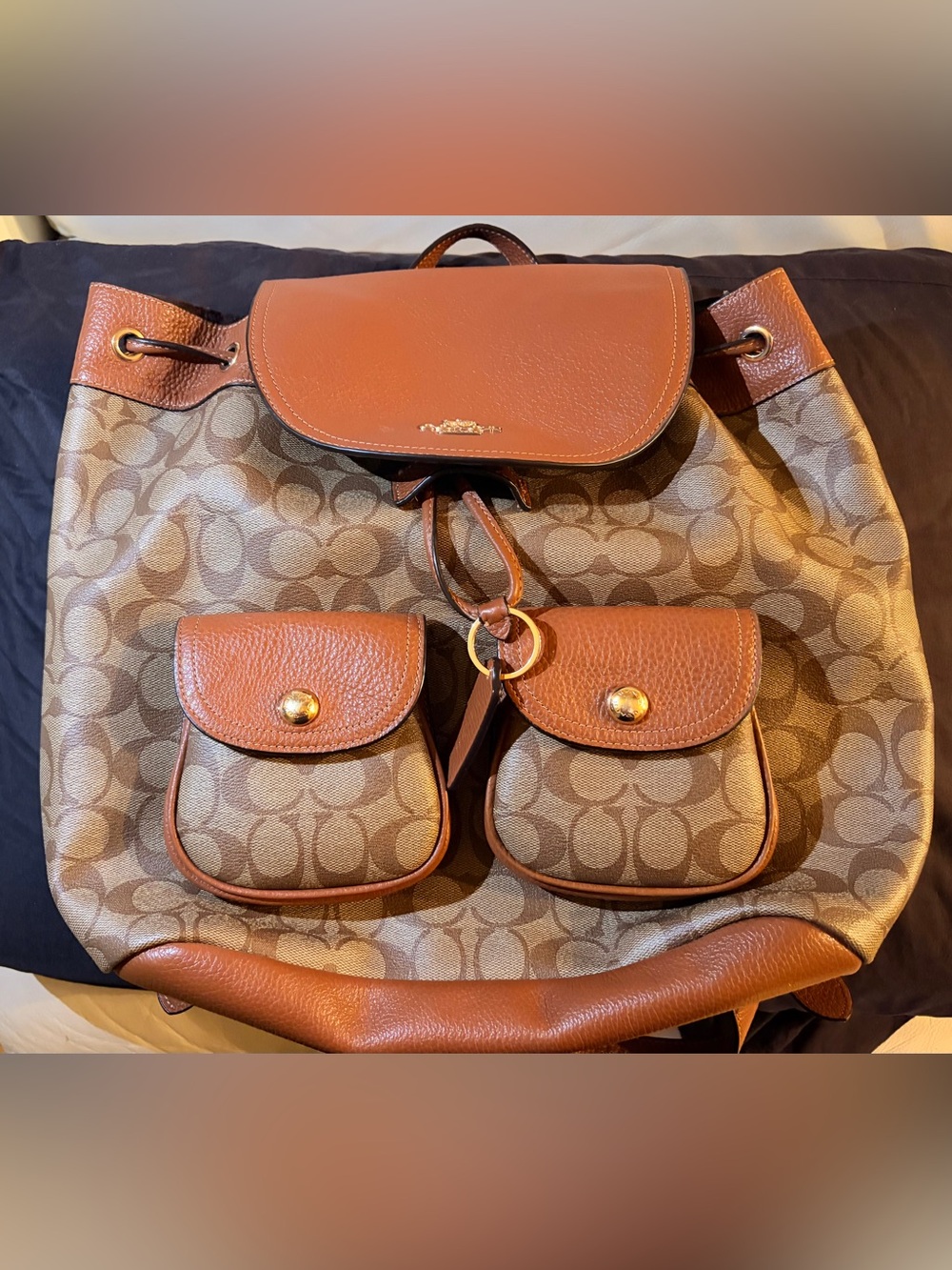 Coach Outlet Signature Canvas Drawstring Backpack in Brown/Tan, Gently Used.